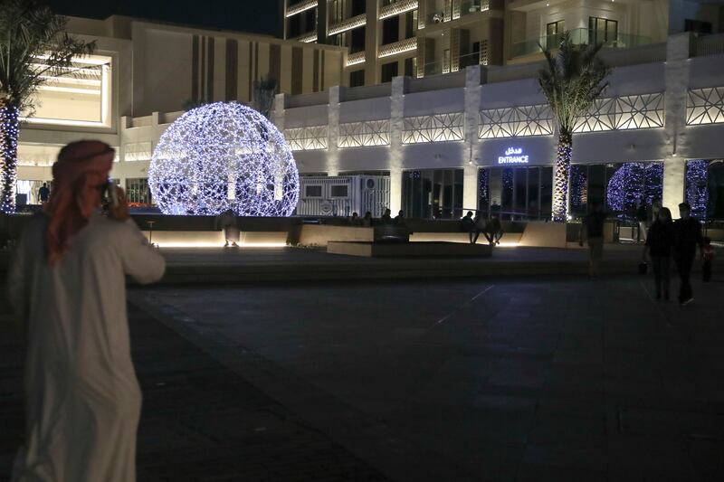 An installation lights up at night at Yas Bay Waterfront.