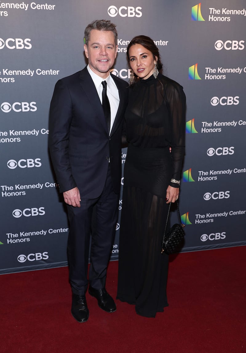 Matt Damon and Luciana Barroso coordinated in black. Getty Images