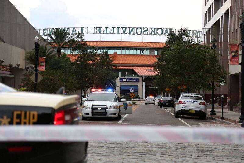 Police officers cordon off a street outside The Jacksonville Landing. Reuters