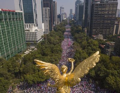 People march along the renowned Paseo de la Reforma in Mexico City against the proposed reform. EPA