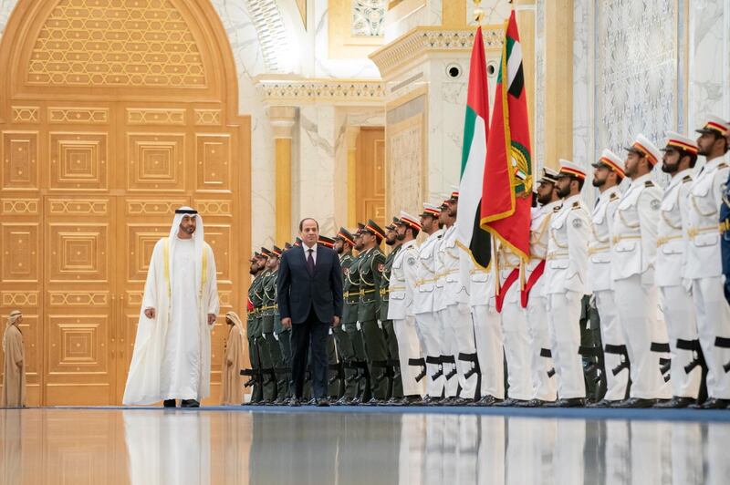 Sheikh Mohamed bin Zayed, Crown Prince of Abu Dhabi and Deputy Supreme Commander of the UAE Armed Forces, and Egypt's President Abdel Fattah El Sisi inspect the Presidential Guard at Qasr Al Watan on Thursday. Courtesy Sheikh Mohamed bin Zayed Twitter