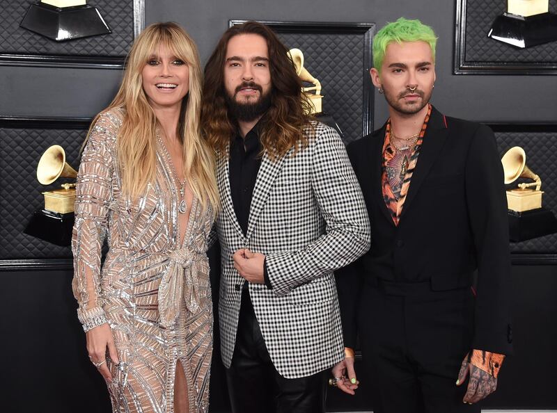 Heidi Klum, Tom Kaulitz and Bill Kaulitz arrive at the 62nd annual Grammy Awards at the Staples Center on Sunday, Jan. 26, 2020, in Los Angeles. AP