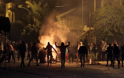 TOPSHOT - Tunisian protesters take to the streets in Siliana, some 130 kms south of Tunis, late on January 11, 2018. 
More than 200 people have been arrested and dozens of police hurt during clashes in Tunisia, the interior ministry said, as anger over austerity measures spilt over into unrest
 / AFP PHOTO / Faouzi DRIDI