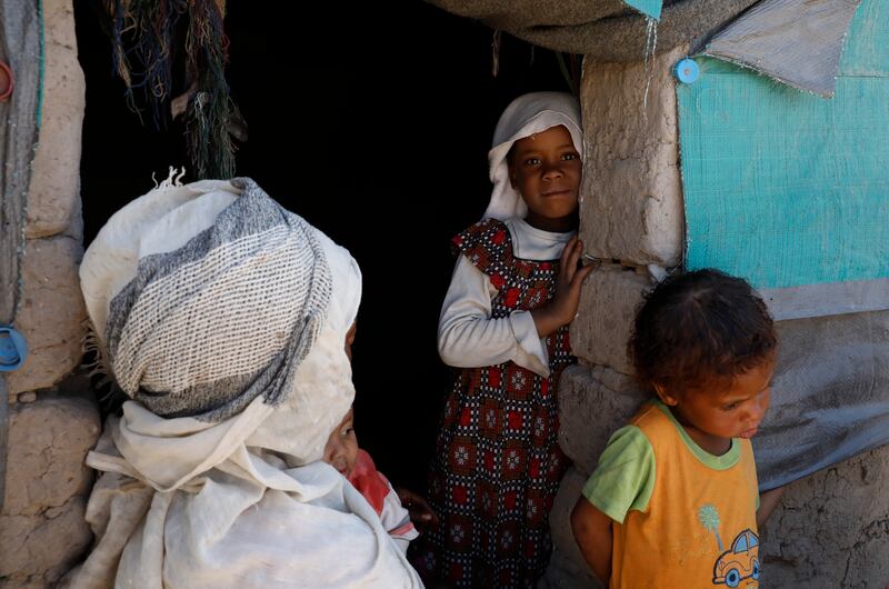 Displaced Yemenis stand at a makeshift shelter at a camp for Internally Displaced Persons on the outskirts of Sanaa, Yemen, on March 9. EPA