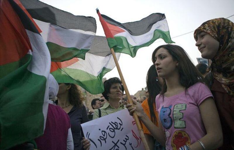 Peace activists protest against the arrests of Amir Makhoul and Omar Sayid, in the northern Israeli city of Haifa.