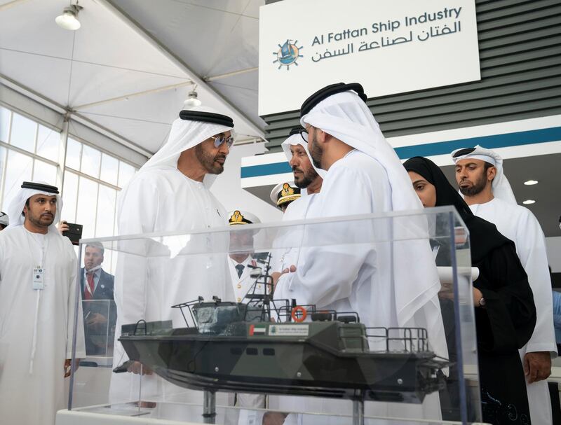 ABU DHABI, UNITED ARAB EMIRATES - February 20, 2019: HH Sheikh Mohamed bin Zayed Al Nahyan, Crown Prince of Abu Dhabi and Deputy Supreme Commander of the UAE Armed Forces (2nd L) visits Al Fattan Ship Industry stand, during NAVDEX, at Abu Dhabi National Exhibition Centre (ADNEC).
( Ryan Carter for the Ministry of Presidential Affairs )
---