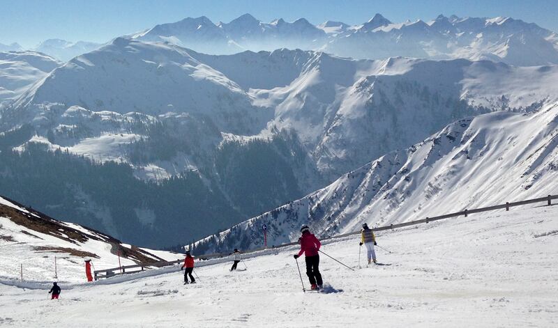 Skiers in the mountains near Saalbach, Austria, where authorities want to encourage health tourism. Photo: AP