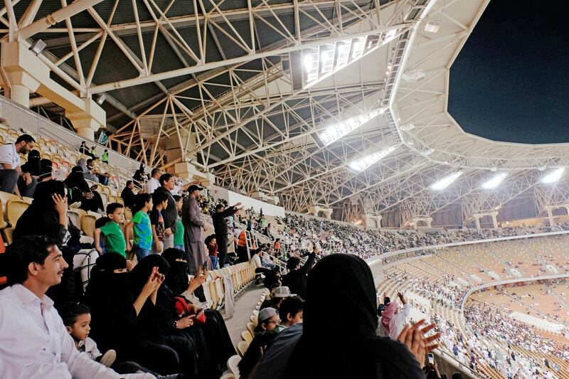 Saudi women watch the soccer match between Al-Ahli against Al-Batin at the King Abdullah Sports City in Jeddah, Saudi Arabia January 12, 2018. REUTERS/Reem Baeshen  NO RESALES. NO ARCHIVES     TPX IMAGES OF THE DAY