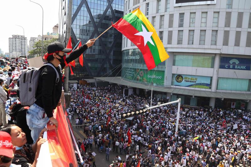 Protesters take part in a demonstration against the military coup in front of the Chinese embassy in Yangon. AFP