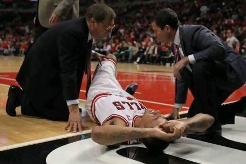 Though they won their play-off opener against the Philadelphia 76ers, the mood in the Chicago Bulls locker room after the game was somber because of the injury to Derrick Rose.