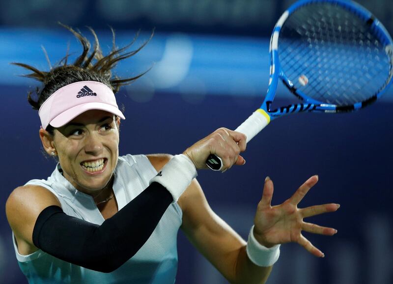 epaselect epa07377620 Garbine Muguruza of Spain in action during her first round match against Dayana Yastremska of Ukraine at the Dubai Duty Free Tennis WTA Championships 2019 in Dubai, United Arab Emirates, 17 February 2019.  EPA/ALI HAIDER