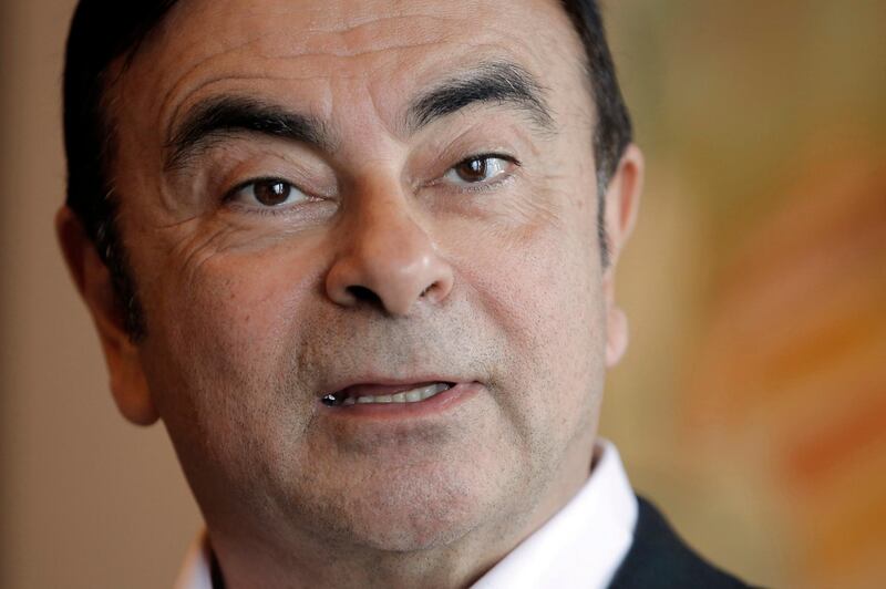 FILE - In this April 20, 2018, file photo, then Nissan Chairman Carlos Ghosn speaks during an interview in Hong Kong. Japan's court has denied the prosecutor's request to extend detention of ex-Nissan chair Carlos Ghosn. Ghosn, facing financial misconduct charges in Japan, says he will hold a news conference April 11. Ghosn said Wednesday on his new verified Twitter account he is getting ready to tell the truth. (AP Photo/Kin Cheung, File)