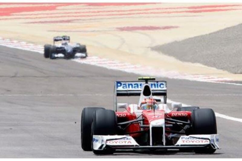 Toyota Formula One driver Timo Glock of Germany drives into pit lane during practice for the Bahrain F1 Grand Prix in Manama on April 24, 2009.