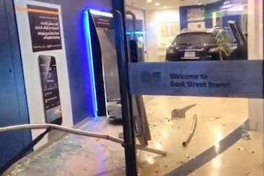 Two people were injured on Thursday night after a driver lost control of his vehicle and crashed into an ATM booth at Burjuman shopping centre, Dubai Police said. 