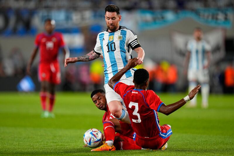 Panama's Kevin Galvan fouls Argentina's Lionel Messi. AP Photo 