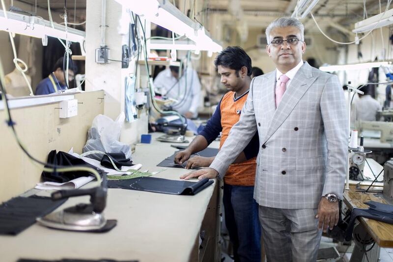 Bharat Parmar, director at Parmar Tailors workshop. Reem Mohammed / The National