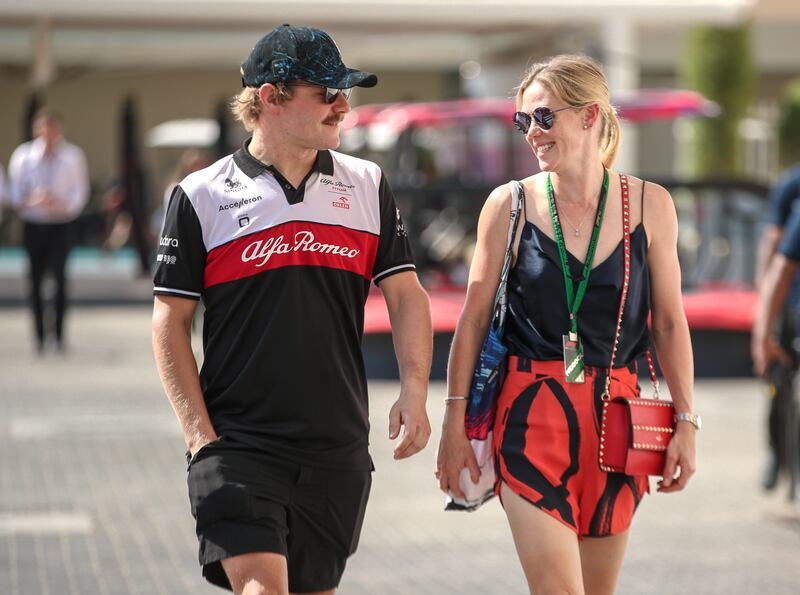 Alfa Romeo driver Valtteri Bottas with girlfriend, Tiffany Cromwell, arrive at Yas Marina Circuit