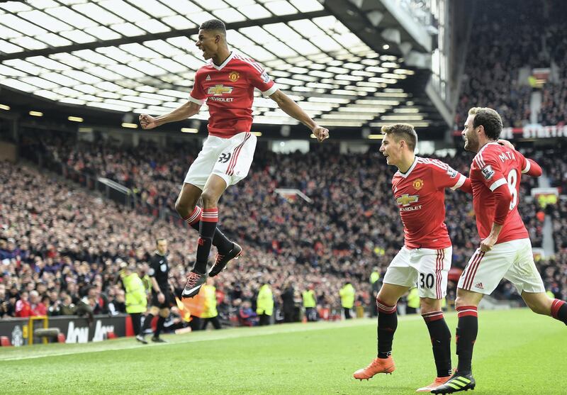 MANCHESTER, ENGLAND - FEBRUARY 28:  Marcus Rashford of Manchester United celebrates scoring his opening goal during the Barclays Premier League match between Manchester United and Arsenal at Old Trafford on February 28, 2016 in Manchester, England.  (Photo by Laurence Griffiths/Getty Images)