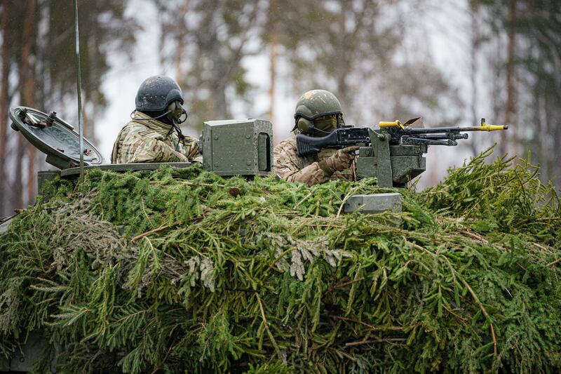 British soldiers on manoeuvres in Estonia during Nato exercise Bold Dragon alongside Estonian, Danish and French forces. PA