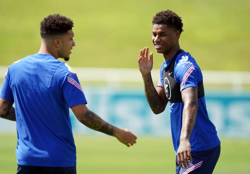 England's Marcus Rashford, right, and Jadon Sancho prepare to face Italy in the Euro 2020 final on Sunday.