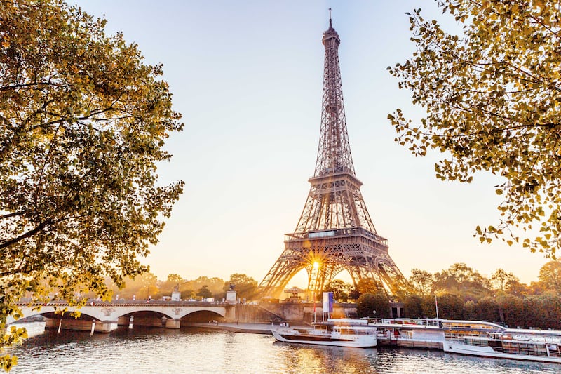 Travellers are visiting destinations as seen on screen, such as the French capital thanks to Emily in Paris. Getty Images