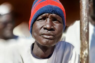 A 59 year old South Sudanese refugee man, sitting in waiting area. Via UNHCR