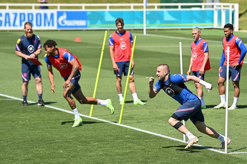 England defender Luke Shaw, right, during a sprinting race at training. AFP