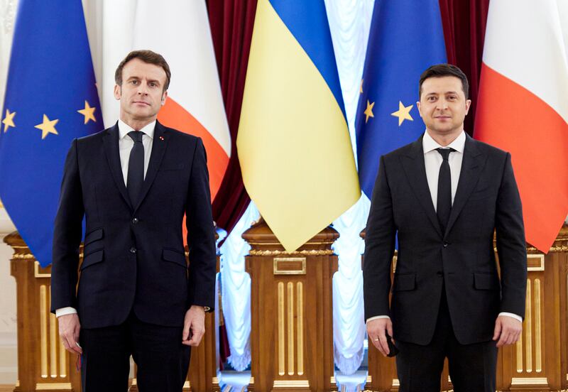 Ukrainian President Volodymyr Zelenskyy, right, and French President Emmanuel Macron during their meeting in Kyiv, Ukraine, on February 8. Ukrainian Presidential Press Office / AP