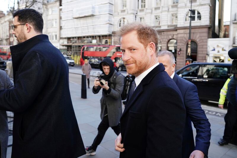 Prince Harry arrives at the High Court in London for a case against British publisher Associated Newspapers. AP