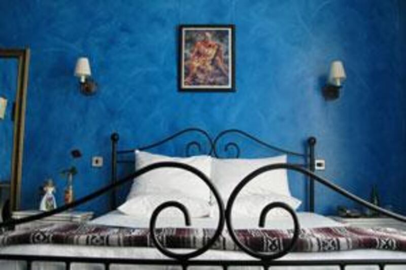 Each of the hotel's 30 rooms are brightly painted and feature a Latin motif antique-style décor.