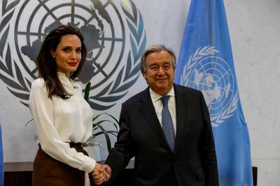 Actor and Special Envoy of the United Nations High Commissioner for Refugees, Angelina Jolie is greeted by United Nations Secretary- General Antonio Guterres at the U.N. Headquarters in New York City, U.S. September 14, 2017. REUTERS/Brendan McDermid