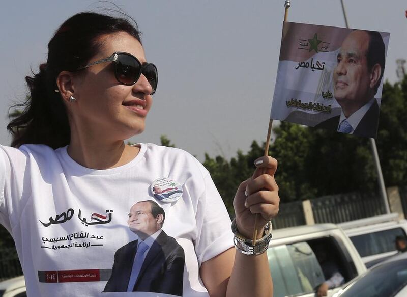 A female supporter of Egypt’s former defence minister Abdel Fattah El Sisi – women in Egypt ‘love him for so many reasons’. Mohamed Abd El Ghany /Reuters