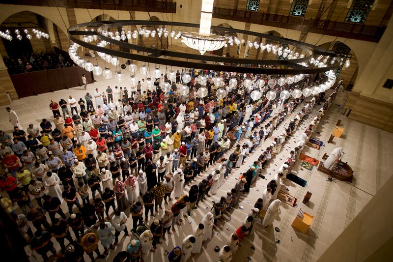Muslims perform late night prayers in Al Fateh Mosque during this year's holy month in Manama, Bahrain. Reuters
