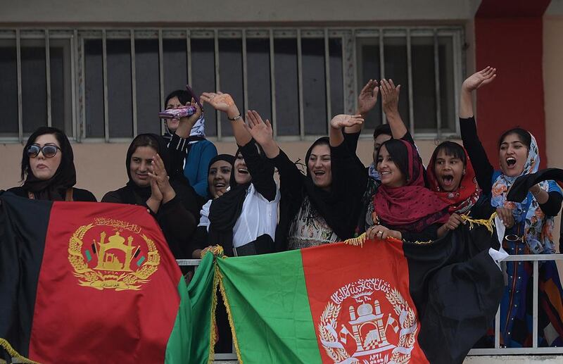 Afghan women celebrate their team's 2-0 victory over India, the dominant force in South Asian football. Shah Marai / AFP Photo