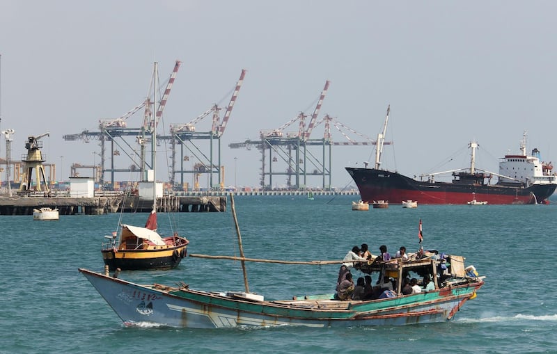 (FILES) In this file photo taken on November 30, 2010, a fishing boat is seen entering the harbour in the southern city of Aden, situated at the mouth of the Red Sea. Saudi Arabia has temporarily halted all oil shipments through a key waterway after Yemen's Iran-aligned Huthi rebels attacked two crude vessels, officials said on July 25, 2018. / AFP / Karim SAHIB
