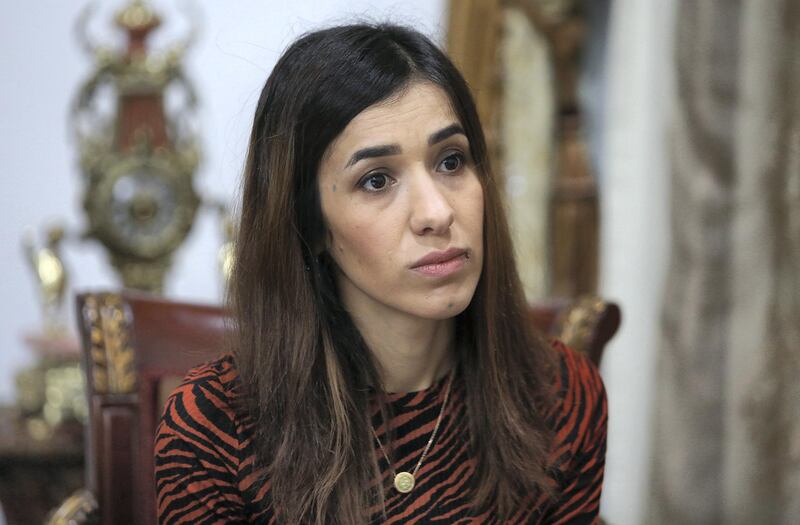 Iraqi Nobel laureate Nadia Murad gestures during a meeting with Iraq's president on December 12, 2018 in Baghdad. - Murad survived the worst of the cruelties and brutality inflicted on her people, the Yazidis of Iraq, by the Islamic State group before becoming a global champion of their cause and a Nobel Peace Prize laureate. (Photo by SABAH ARAR / AFP)