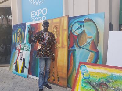 Artist Abdo Fall at the Senegal Pavilion. Saeed Saeed / The National