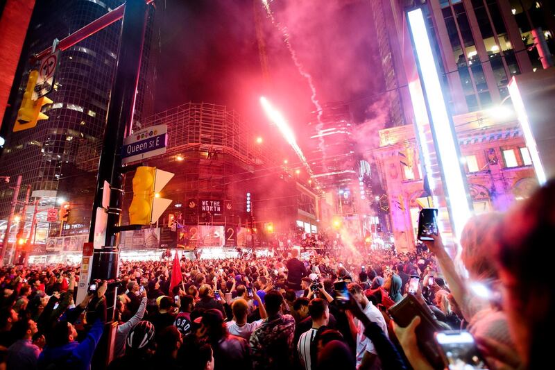 Thousands of fans celebrate in the streets of Toronto. AP Photo