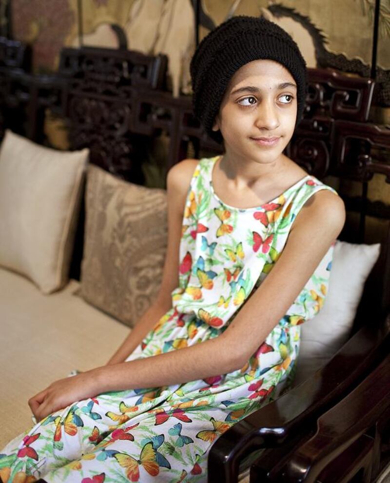 Lujain Hussein in her home in Abu Dhabi. Silvia Razgova / The National






