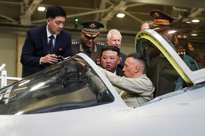 Kim Jong-un is shown the cockpit of a Russian fighter jet while touring an aircraft factory in Komsomolsk-on-Amur. AP