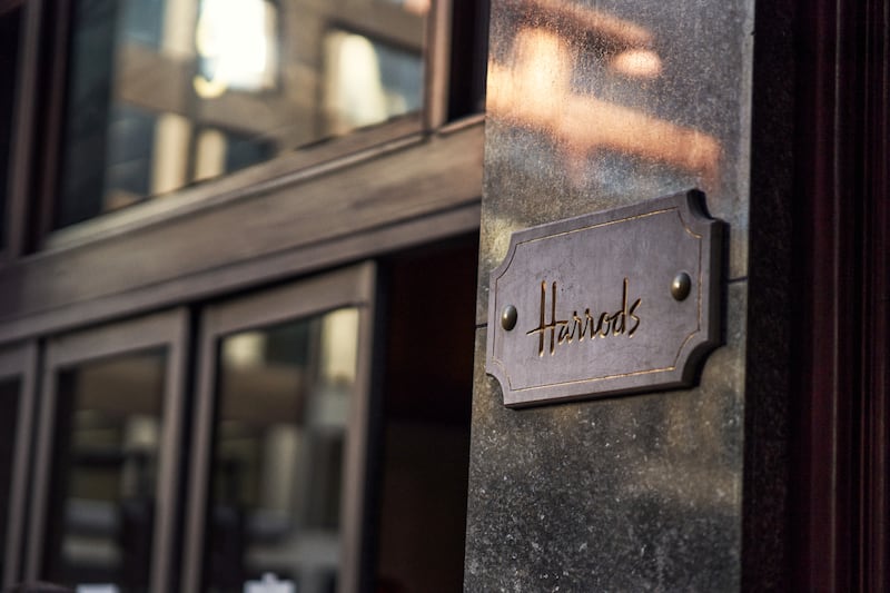 The Harrod's brand on a door to the department store. Julian Broad