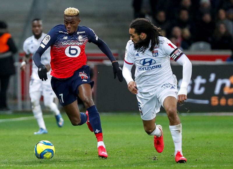 LILLE, FRANCE - MARCH 08: Victor Osimhen #7 of Lille OSC controls the ball against Jason Denayer #5 of Olympique Lyonnais during the Ligue 1 match between Lille OSC and Olympique Lyonnais at Stade Pierre-Mauroy on March 8, 2020 in Lille, France. (Photo by Catherine Steenkeste/Getty Images)