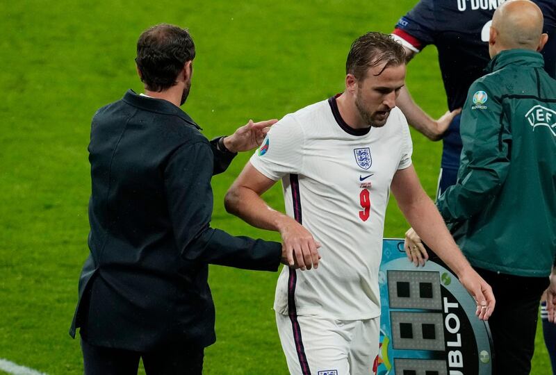 England striker Harry Kane shakes hands with manager Gareth Southgate after being substituted. Reuters