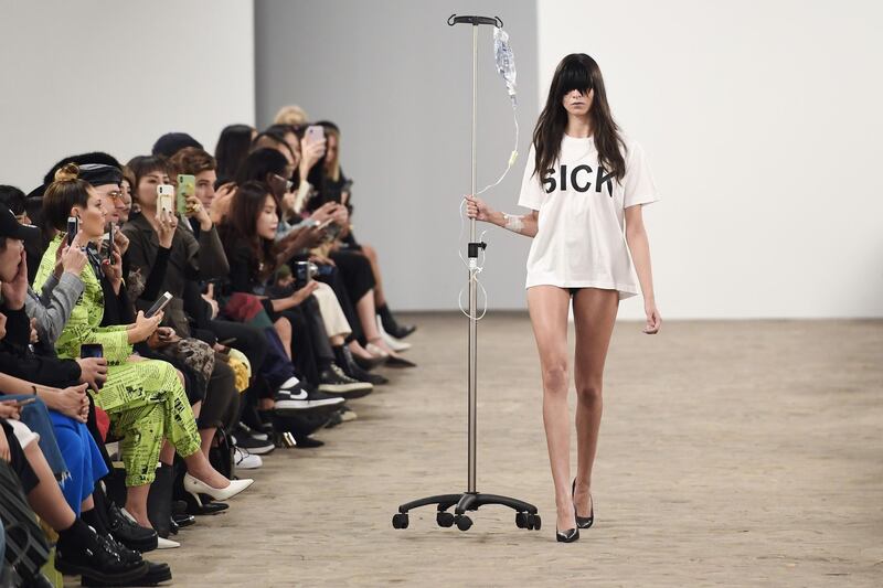 A model presents a creation by Kimhekim during the Women's Spring-Summer 2020 Ready-to-Wear collection fashion show in Paris, on September 23, 2019. / AFP / Christophe ARCHAMBAULT
