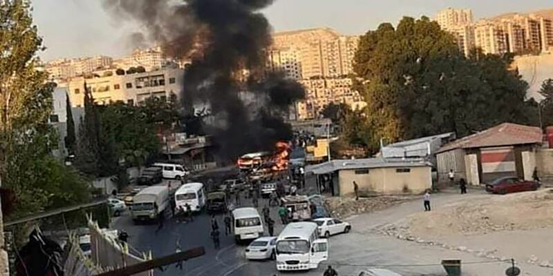 Military bus on fire in Damascus