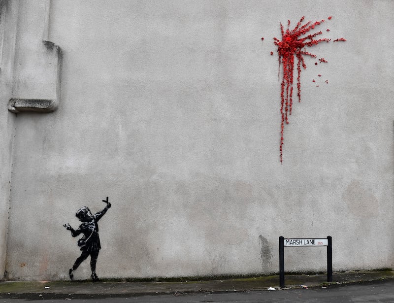 Valentine's Day Mural by Banksy appeared in Bristol on Valentine's Day in 2020. Getty Images