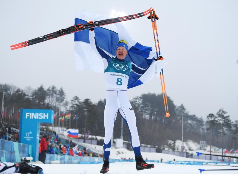livo Niskanen of Finland celebrates winning the gold medal at the 2018 Winter Olympic Games. Matthias Hangst / Getty Images