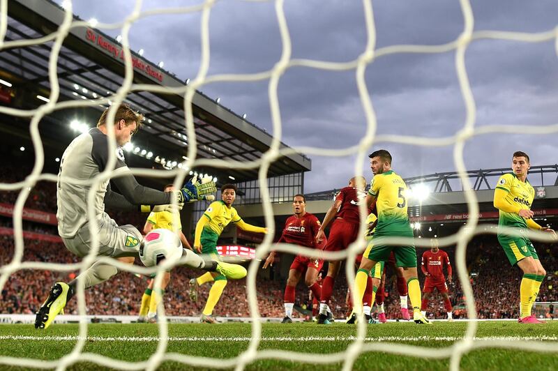 Liverpool defender Virgil van Dijk scores his side's third goal. Getty Images