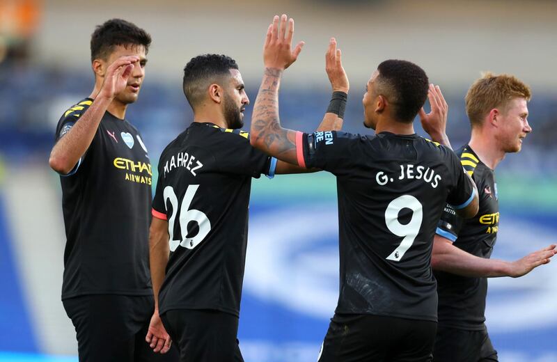 Gabriel Jesus of Manchester City celebrates with teammates after scoring his team's second goal. Getty