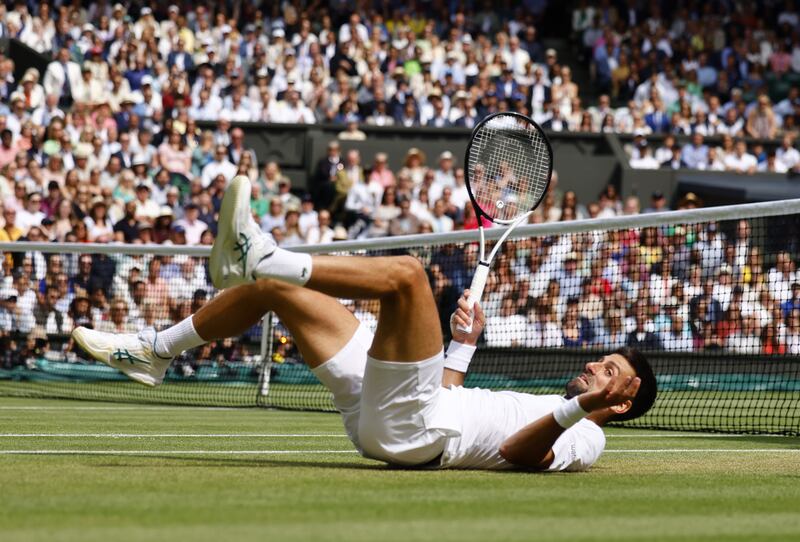 Novak Djokovic takes a tumble. EPA 
